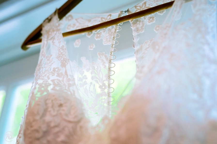 details of a lacy wedding dress