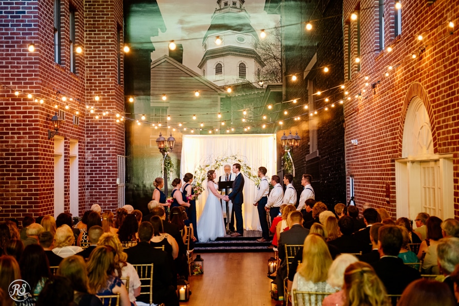Courtyard cafe light wedding ceremony at the Governor Calvert house 