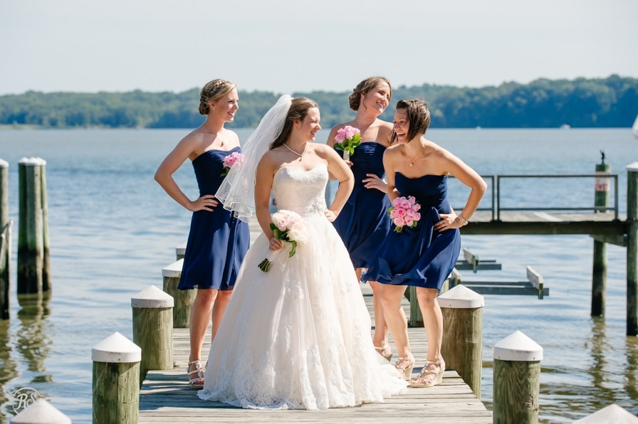bride and bridesmaids on dock