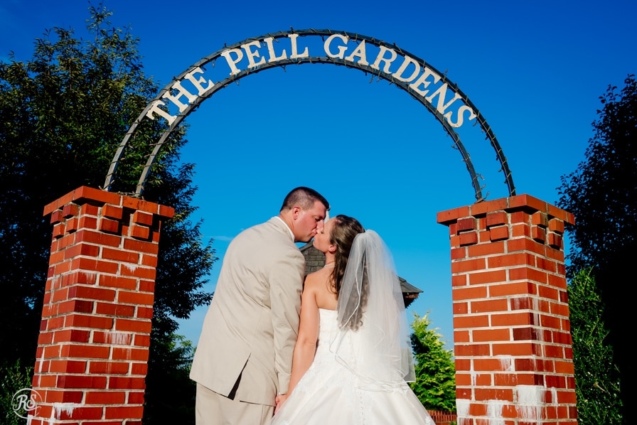 Kiss under the pell garden sign 
