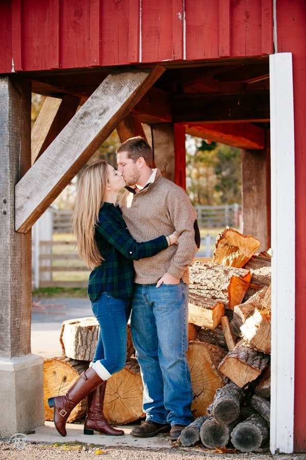 kiss by the wood pile