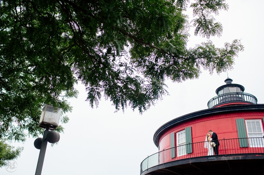 Bride and Groom at the Pier V Lighthouse in Baltimore 