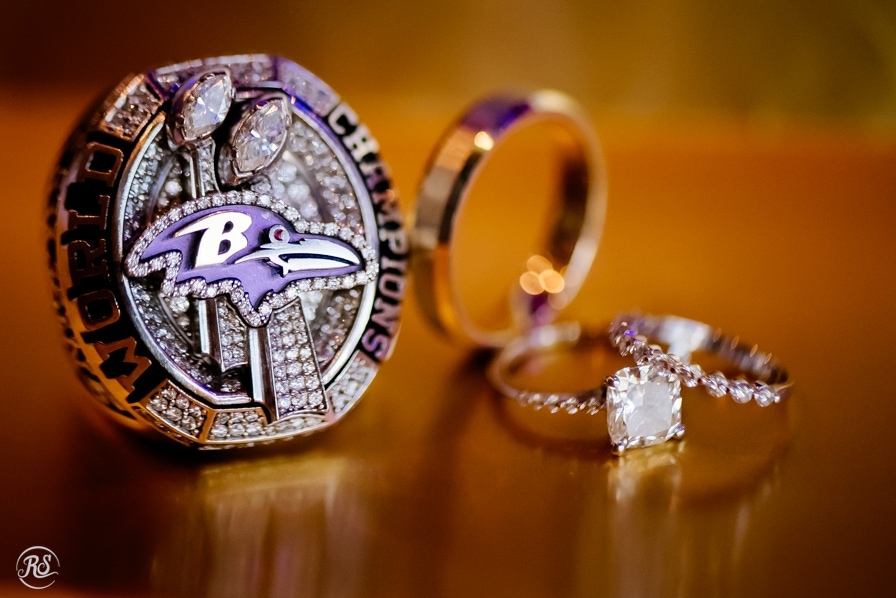 Ravens World Champions Super Bowl ring with wedding rings 