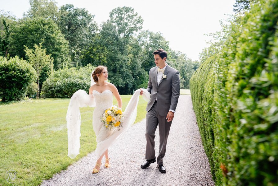 bride and groom walking path