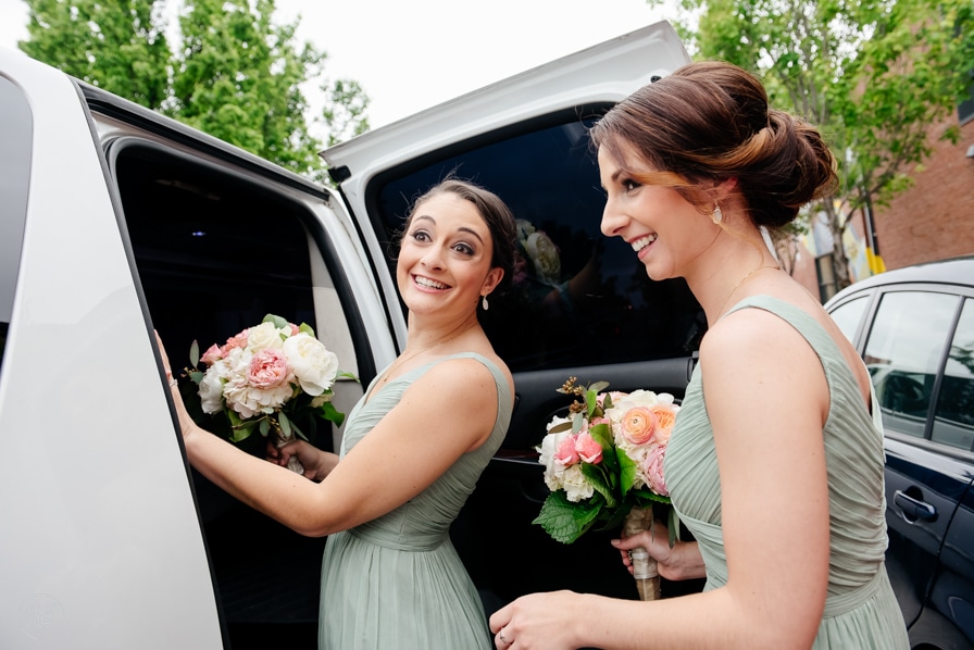 bridesmaids getting into limo