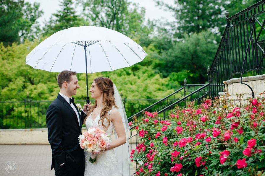 Wedding portraits at the Evergreen Museum in the rain 