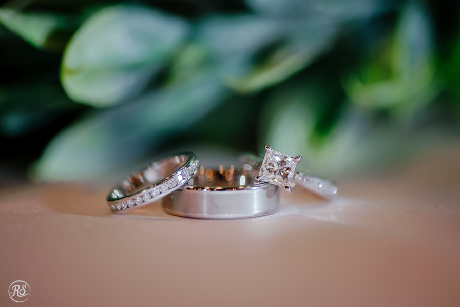 wedding rings with eucalyptus leaves 
