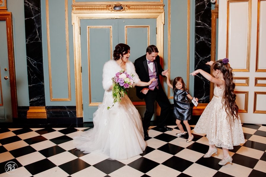 Bride and Groom dancing with Flower girl