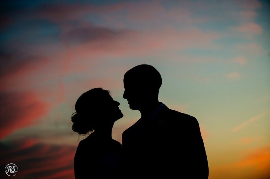 silhouette of Bride and groom at sunset