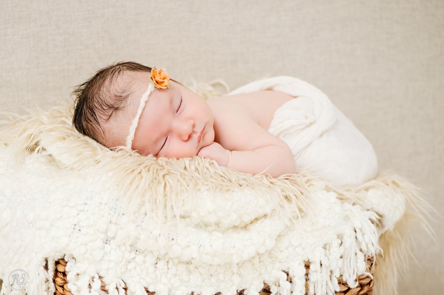 sleeping baby with cute flower headband 