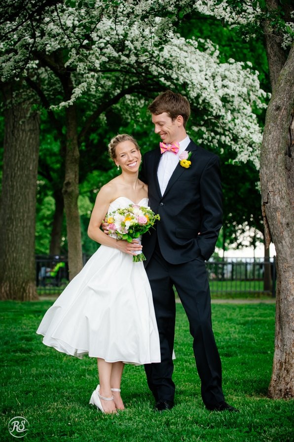 Bride and Groom under flowering tree