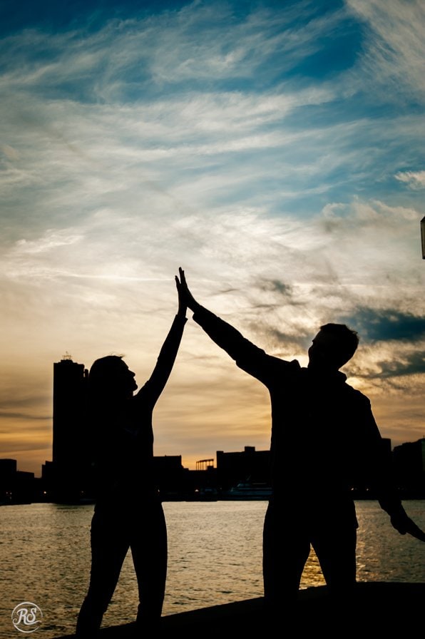 Silhouette of high five