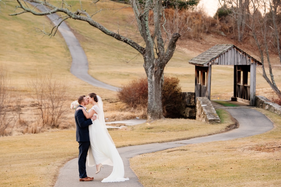 Romantic wedding kiss at Holly Hills Country Club