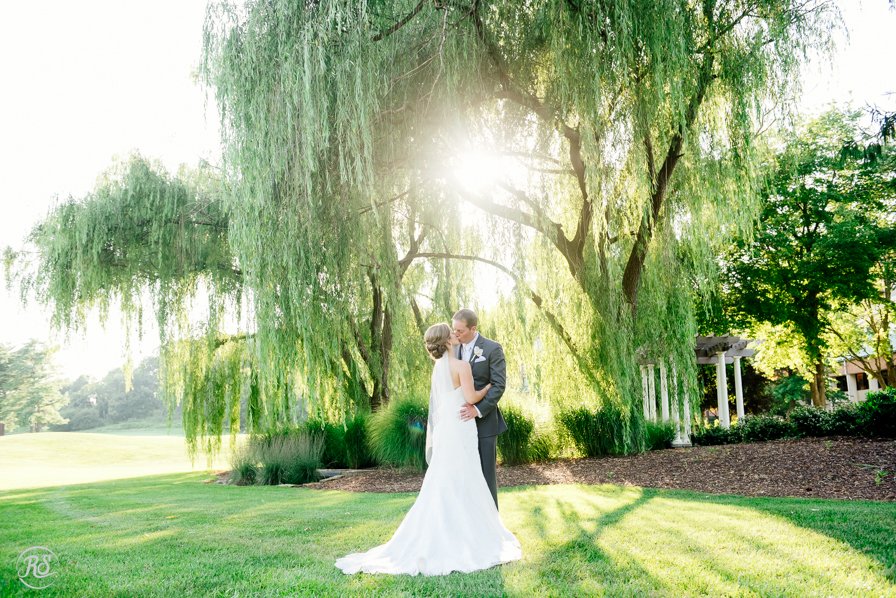 bride and groom under weeping willow 
