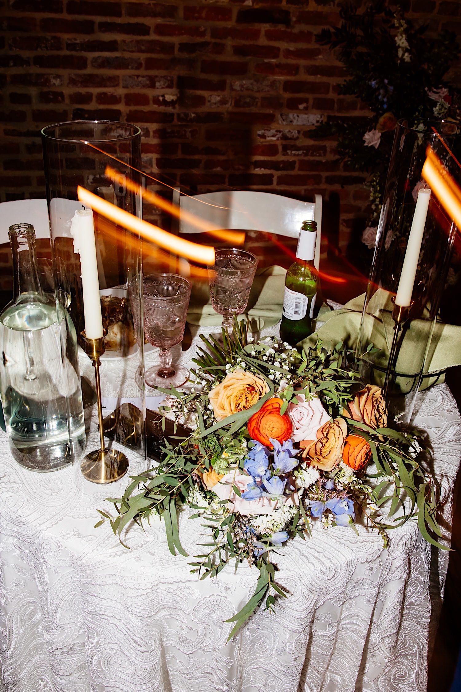 flat lay of details on wedding sweetheart table