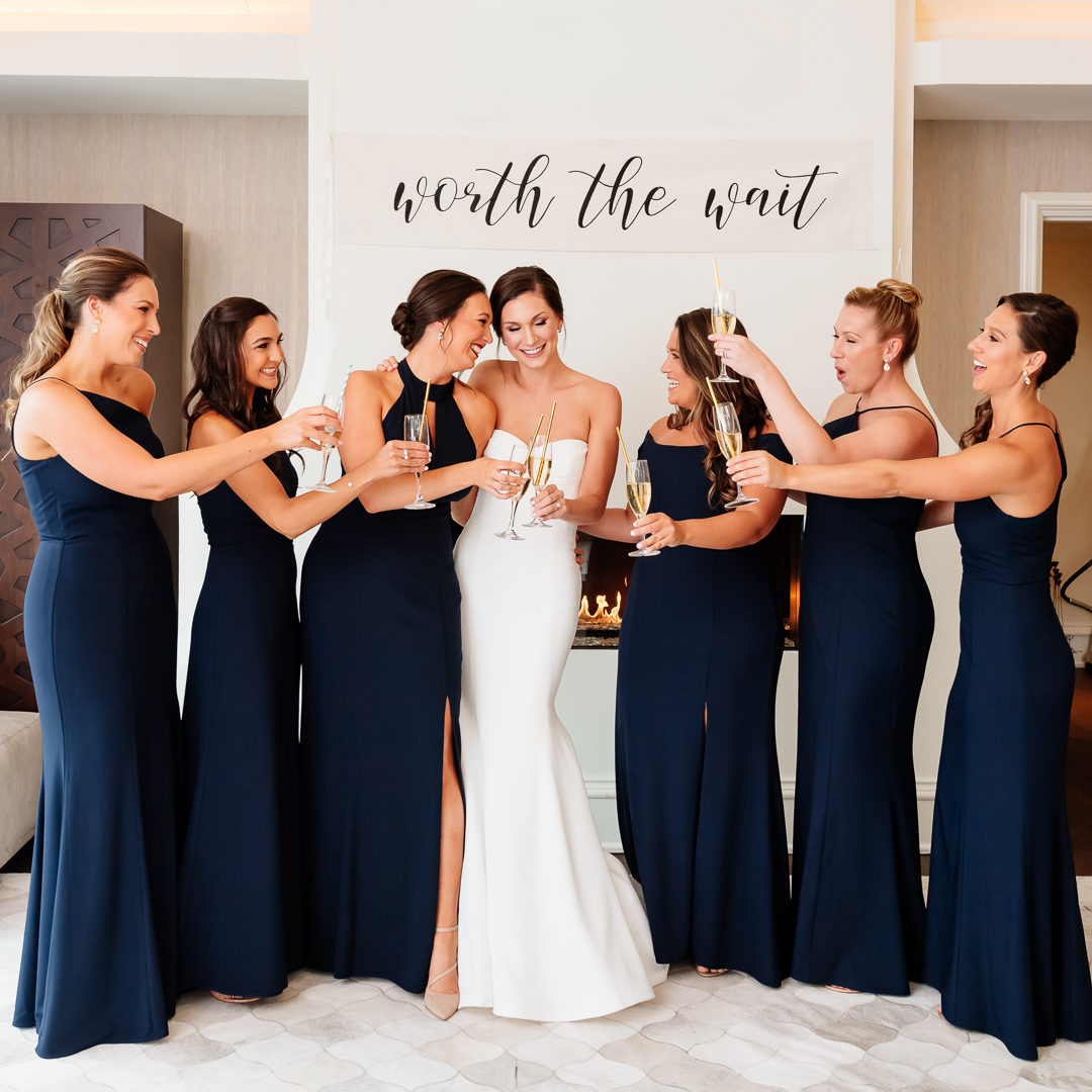 bride toasting with bridesmaids