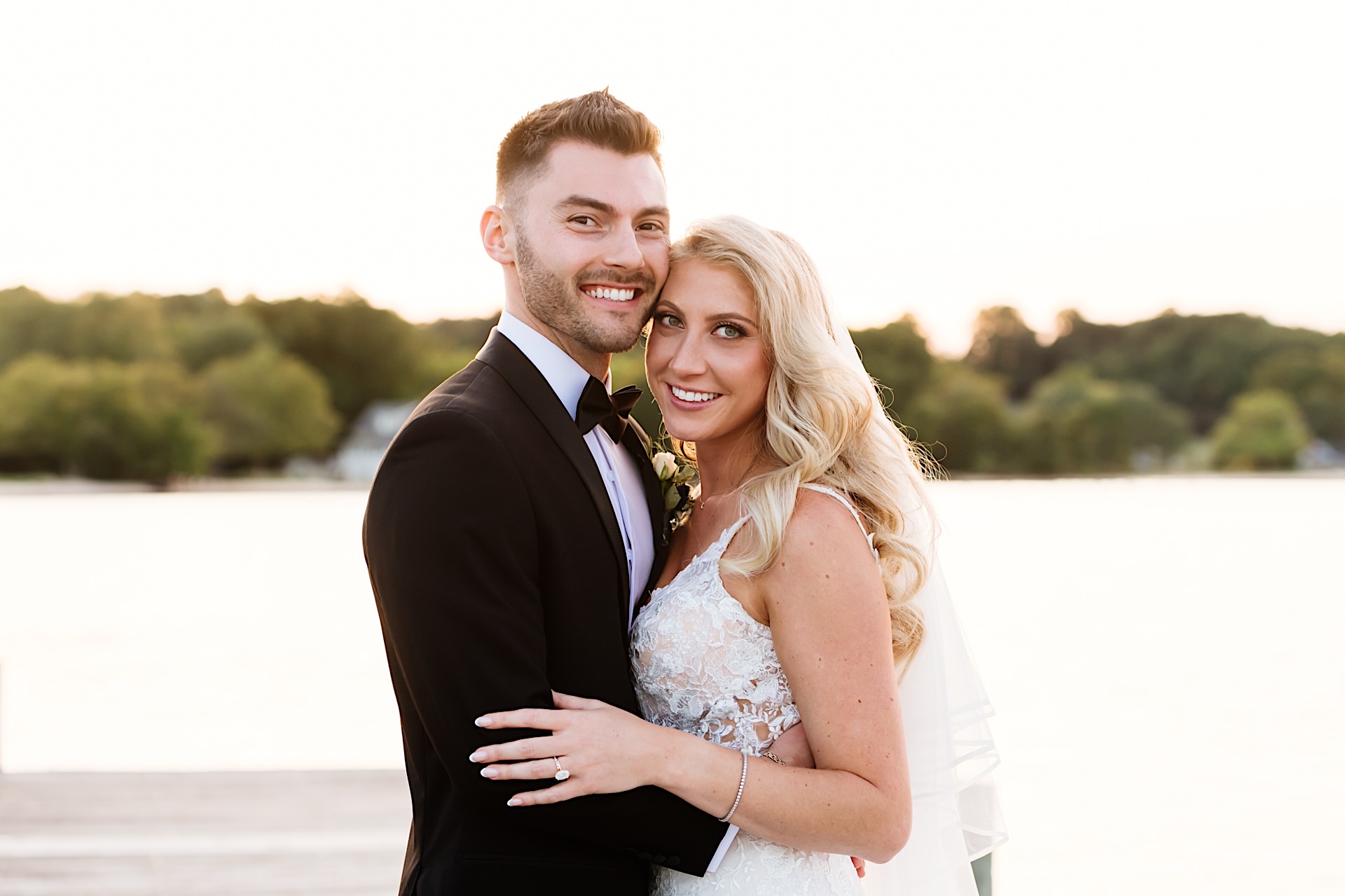 wedding photos at sunset on pier at herrington on the bay