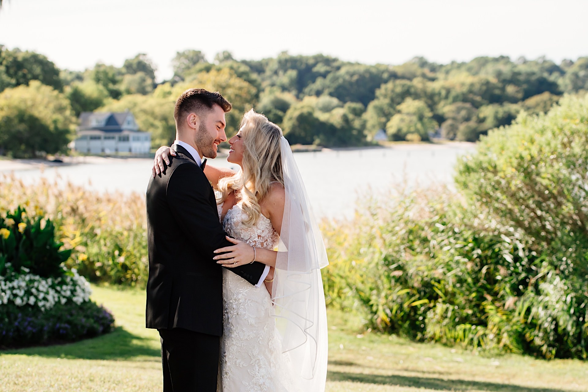 bride and groom candid photos during wedding at herrington on the bay