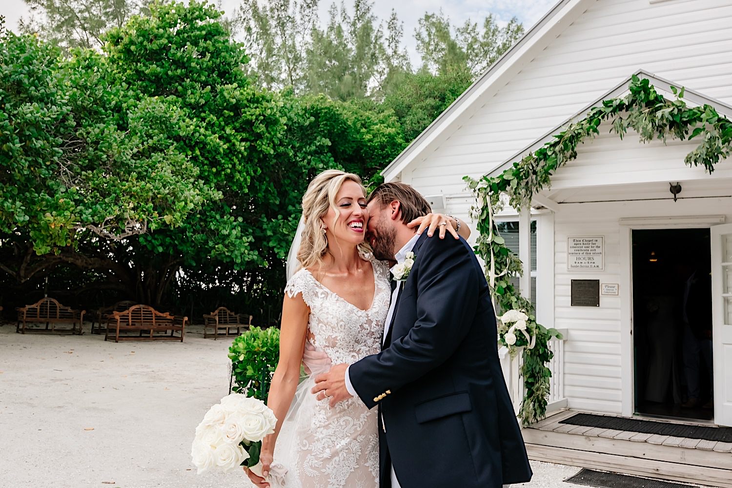bride and groom celebrate at chapel on Captiva island